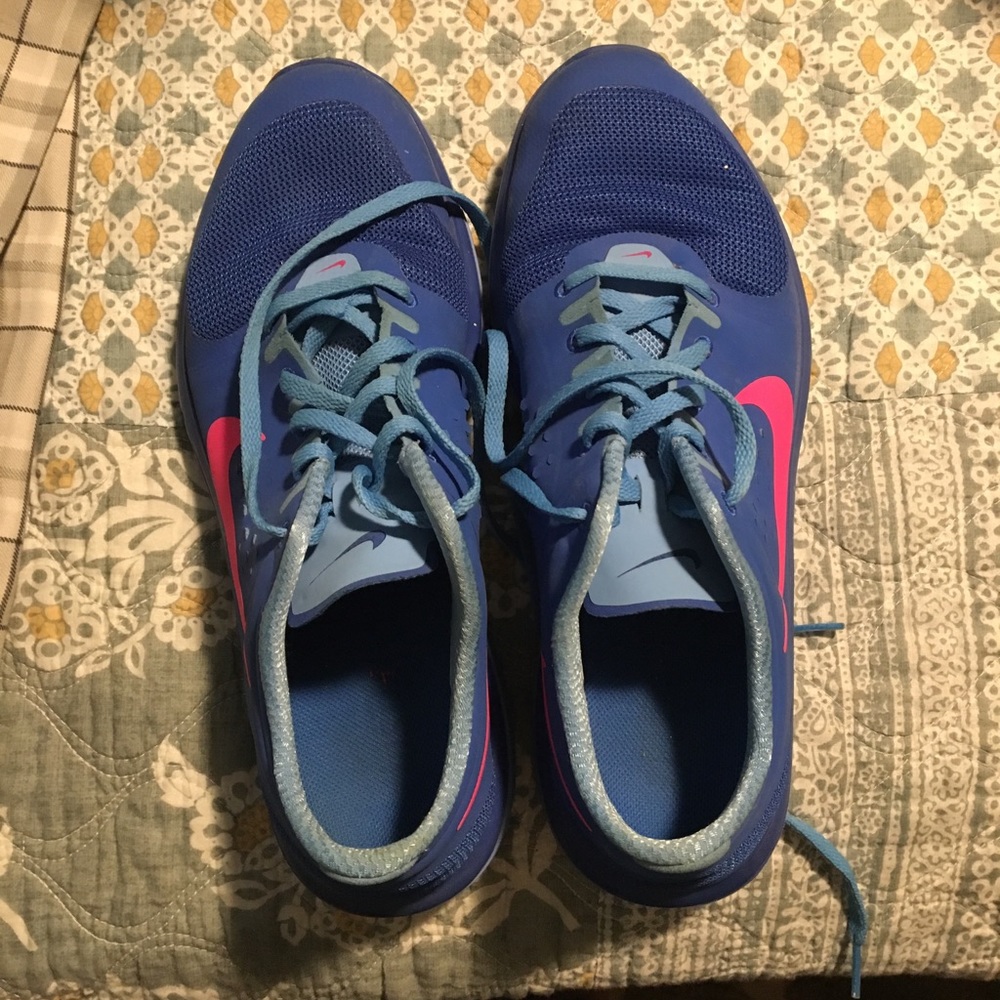Blue woman’s Nike tennis shoes.